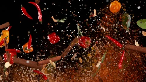 Super slow motion of flying spices mix on black background Stock Footage 252135345