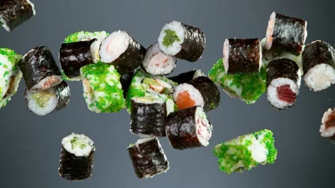 Super slow motion of flying sushi pieces on black background Stock Footage 168937437