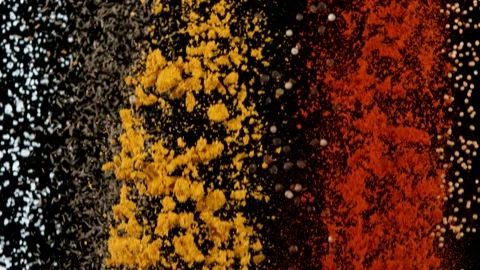 Super slow motion of flying various kinds of mix spices. Stock Footage 159478593