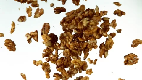 Super slow motion of flying walnut collision Stock Footage 132254823