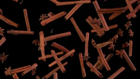 Super slow motion of flying whole cinnamon bark spice. Stock Footage 163787465