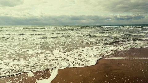 Super Slow Motion foam slides over the shore Stock-Footage 82658402