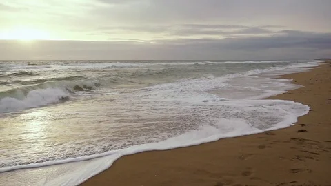 Super Slow Motion Foam Waves Falls on Sand Stock Footage 82971173