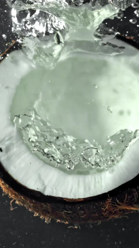 Super slow motion fresh topical coconuts . Filmed on a high-speed camera at 1000 動画素材 335375668