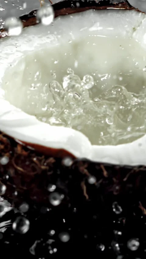 Super slow motion fresh topical coconuts . Filmed on a high-speed camera at 1000 動画素材 335376206