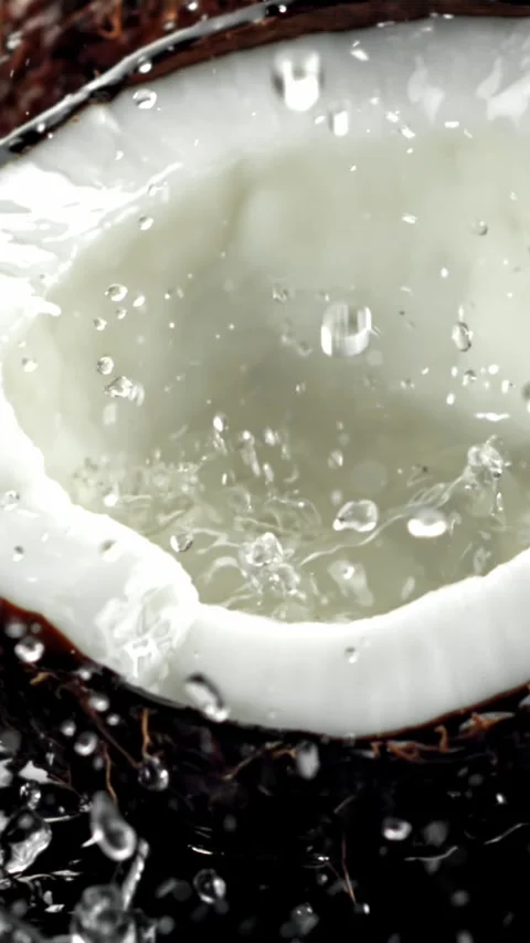 Super slow motion fresh topical coconuts . Filmed on a high-speed camera at 1000 動画素材 335380824
