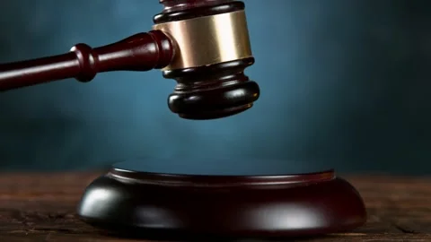 Super slow motion of gavel being struck to decide an auction or guilty verdict Stock Footage 155599699
