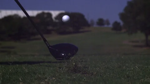 Super Slow Motion Golf Ball Hit With Driver Club off Tee Box Down Fairway Stock Footage 124246009