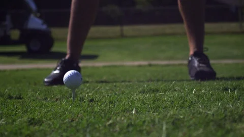 Super Slow Motion Golf Ball Hit With Driver Club off Tee Box Down Fairway Stock Footage 124246165
