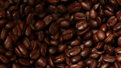 Super slow motion of grinding coffee beans. Video stock 113691773