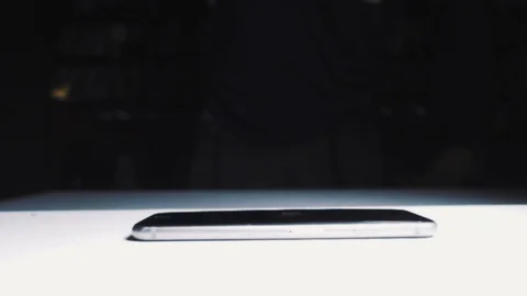 Super slow motion guy smashes a phone display hammer Stock Footage 93522857