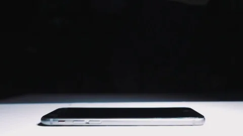 Super slow motion guy smashes a phone display hammer Stock Footage 93522944