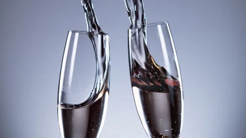 Super slow motion of having a toast with two champagne glasses Stock Footage 147277956