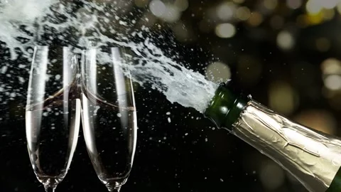 Super slow motion of having a toast with two champagne glasses Stock Footage 165276497