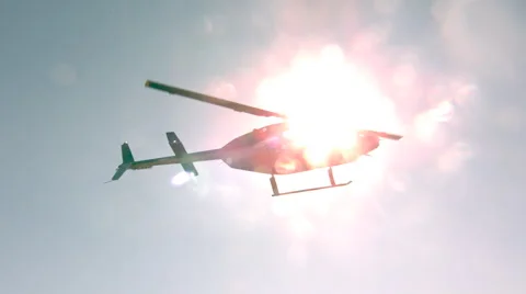 Super slow motion helicopter with sun Stock Footage 61741044
