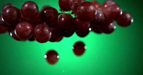 Super slow motion, High Contrast Studio Shot Of Dewy Red Grapes Against Bright G Stock Footage 328962368