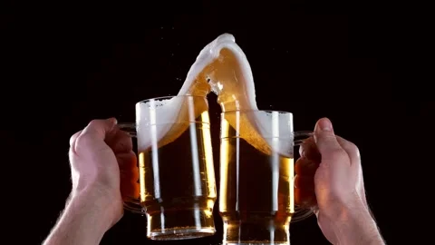 Super slow motion of hitting beer mugs together, cheers concept Stock Footage 147280350