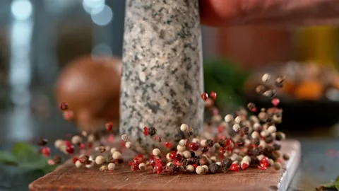 Super slow motion of hitting mortar pestle on pepper seeds Stock Footage 166969498