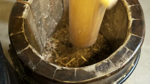 Super slow motion of hitting mortar pestle on pepper seeds. Stock Footage 234589821