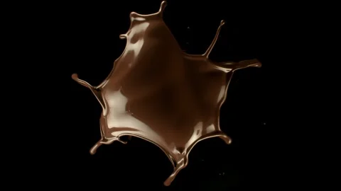 Super slow motion of hot chocolate splash on black background Stock Footage 244403198