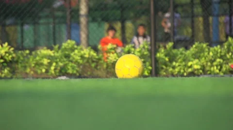 Super slow-motion of kicking ball Stock Footage 46971552