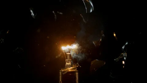Super slow motion of light bulb explosion isolated on black background. Stock-Footage 94471444