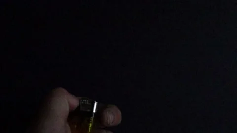 Super Slow-Motion. Lighter with flame. 940fps Stock Footage 154351662