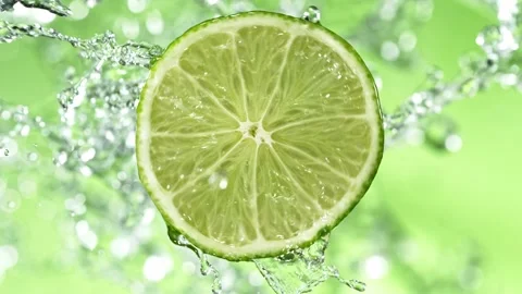 Super Slow Motion of Lime Slice With Water Splashes. Stock Footage 201019413