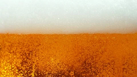 Super slow motion of macro shot of beer drink bubbling, close-up. Stock Footage 186168603