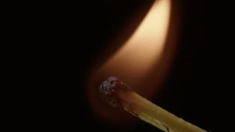 Super Slow Motion Macro Shot of Igniting Match against Black Background Stock Footage 226599131