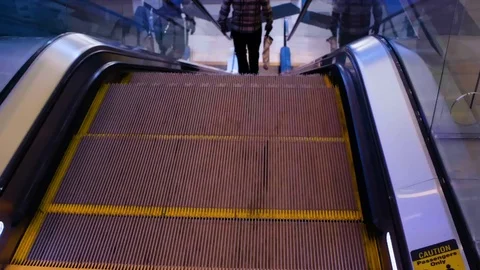 Super slow motion of man going down escalator 480fps 스톡 동영상 123173918