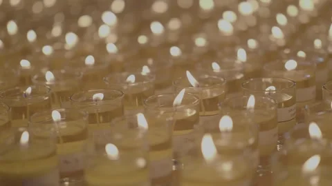 Super slow motion of many mini Pelita Candles full screen in a group Stock Footage 304608552