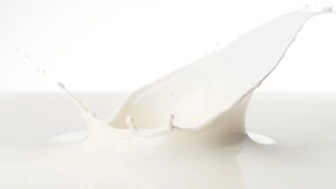 Super slow motion of milk splash isolated on white background Stock Footage 150737477