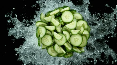 Super slow motion of mix salad with splashing water. Stock Footage 223672564