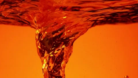Super slow motion of mixing cola or alcoholic drink drink Stock Footage 148150402