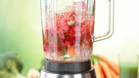 Super slow motion of mixing pieces of vegetables in blender. Stock Footage 170165667