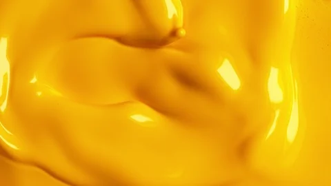 Super slow motion of mixing yellow paint. Abstract background. Stock Footage 113489539