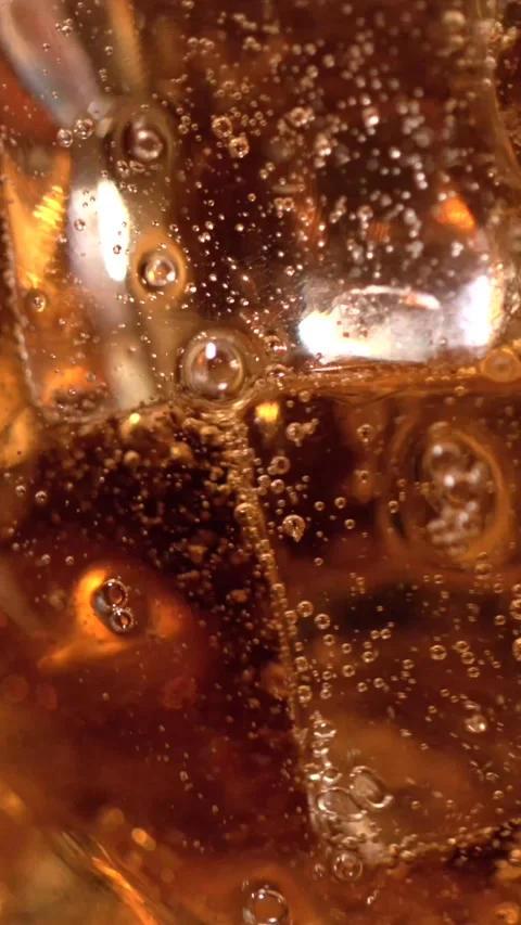 Super slow motion, Mixologist Studies Rising Bubbles In Drink Vertical Fizz Stock Footage 330110924