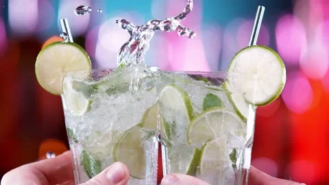 Super slow motion of mojito drinks in cheers gesture Stock Footage 147273782