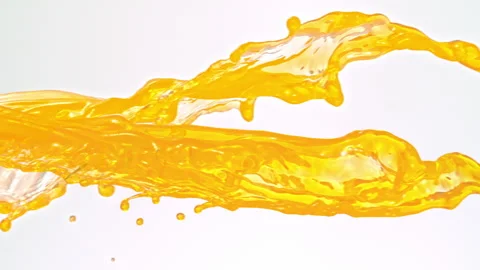 Super Slow Motion Orange Juice Splashes at 1000fps, High-Speed 4K Footage on Stock Footage 339564857