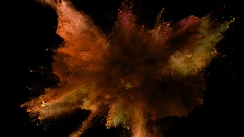Super slow motion of orange powder explosion isolated on black background. Stock Footage 108535472