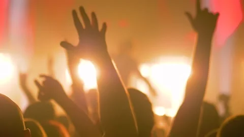 Super slow motion: people crowd silhouette partying at rock concert Vidéo 136431963
