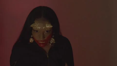 Super Slow Motion Portrait of Performer With Horn Prosthetics and SFX Makeup Stock Footage 347651329