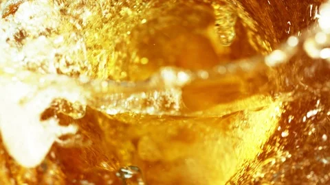Super slow motion of pouring beer or spirit drink in twister shape Stock Footage 108788991