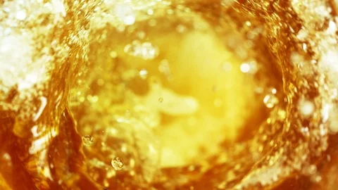 Super slow motion of pouring beer or spirit drink in twister shape Free Stock Footage 108795587