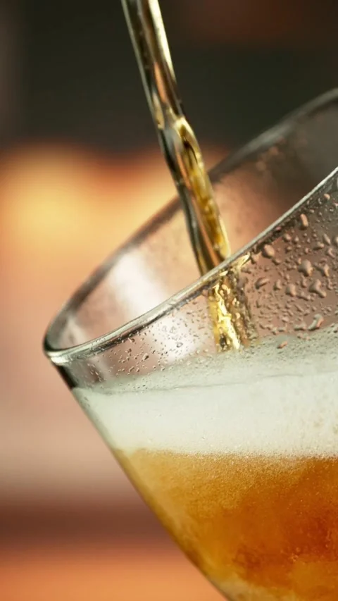 Super Slow Motion of Pouring Beer into Long Pint. Stock Footage 289317002