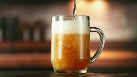Super Slow Motion of Pouring Beer into Pint. Stock Footage 290396710