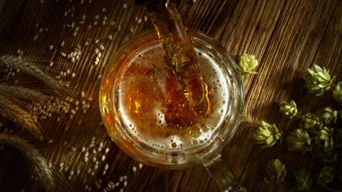 Super Slow Motion of Pouring Beer Inside Glass With Camera Motion Into Liquid at Video stock 317145631