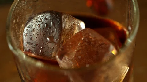Super slow motion of pouring cola into glass. Stock Footage 118229207