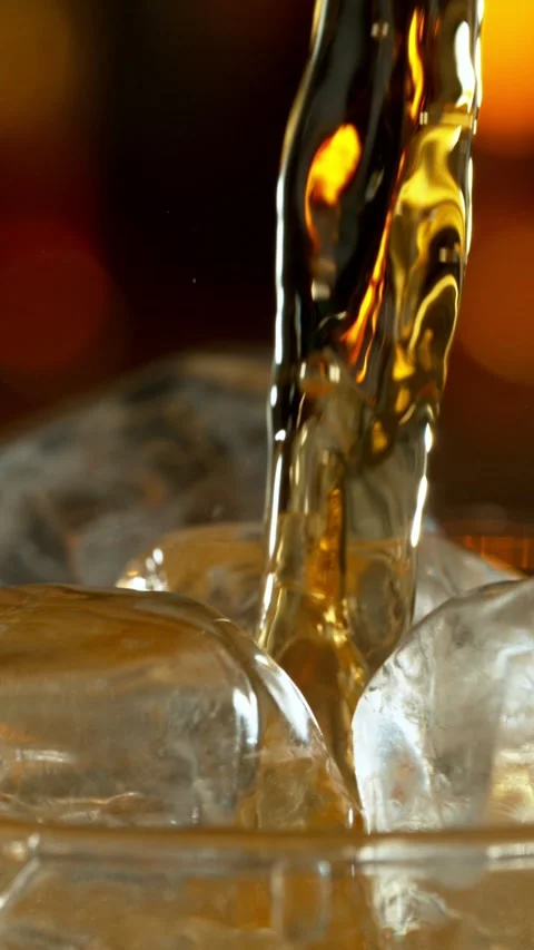 Super slow motion of pouring cola into glass. Stock Footage 293088982